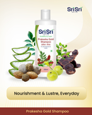 Sri Sri Prakesha Gold Shampoo bottle with natural ingredients on a beige background