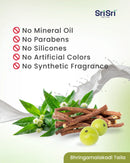 Product with natural ingredients and Sri Sri Tattva branding, highlighting no mineral oil, parabens, silicones, artificial colors, or synthetic fragrances.
