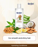 Sri Sri Tattva hydrating conditioner bottle with natural ingredients on a beige background