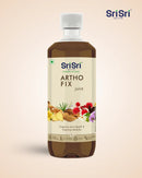 Sri Sri Artho Fix juice bottle on a beige background