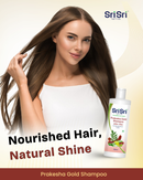 Woman with long, healthy hair holding a bottle of Sri Sri Prakesha Gold Shampoo.