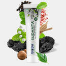 Sudanta charcoal and salt toothpaste tube with ingredients on a white background