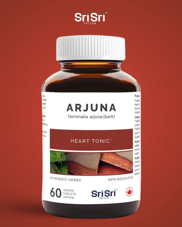 High-resolution close-up of the Arjuna Heart Tonic bottle, highlighting the NPN 80034304 and 60 vegan tablets.
