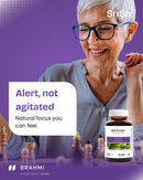 Senior woman focused while playing chess — calm, steady alertness with Brahmi (Bacopa) support